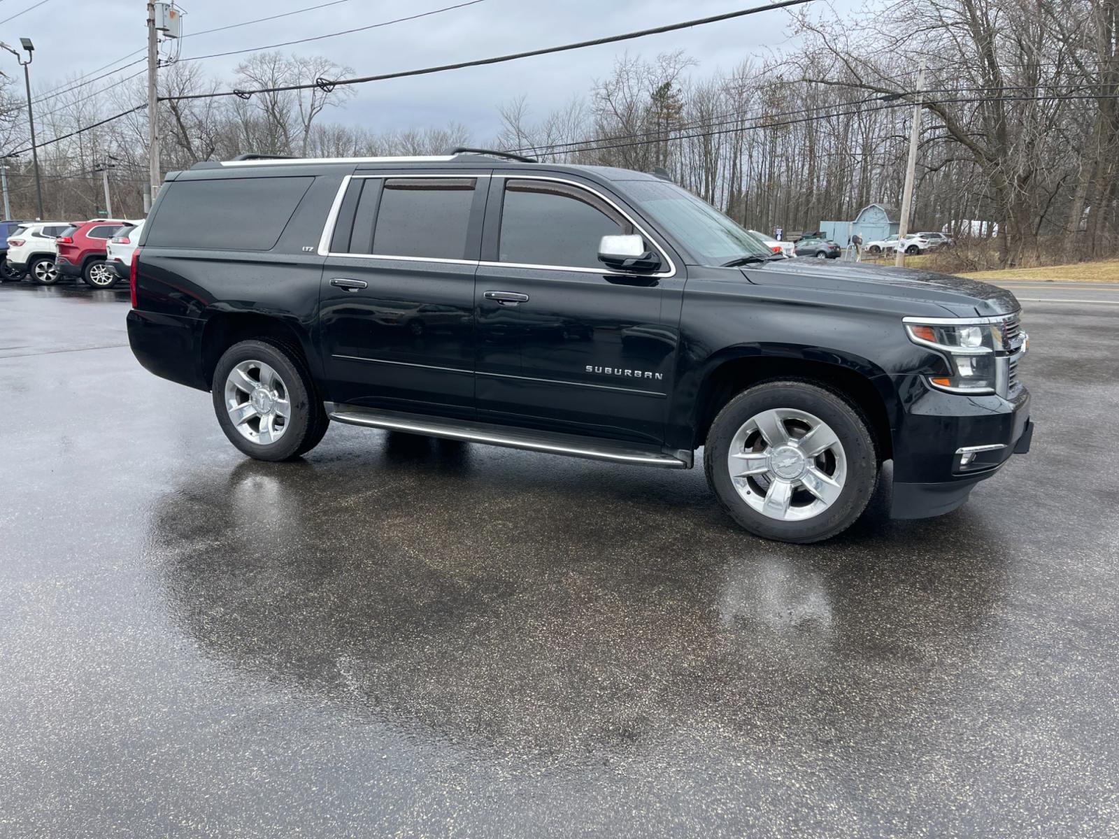 2016 Black /Brown Chevrolet Suburban LTZ 4WD (1GNSKJKC3GR) with an 5.3L V8 OHV 16V engine, 6A transmission, located at 11115 Chardon Rd. , Chardon, OH, 44024, (440) 214-9705, 41.580246, -81.241943 - This 2016 Chevrolet Suburban LTZ 4WD comes equipped with a 5.3 Vortec V8 engine and a 6-speed automatic transmission, offering a robust 8,000-pound towing capacity. It's designed with luxury and convenience in mind, featuring heated and cooled front seats, heated second-row seats, and a range of saf - Photo #3